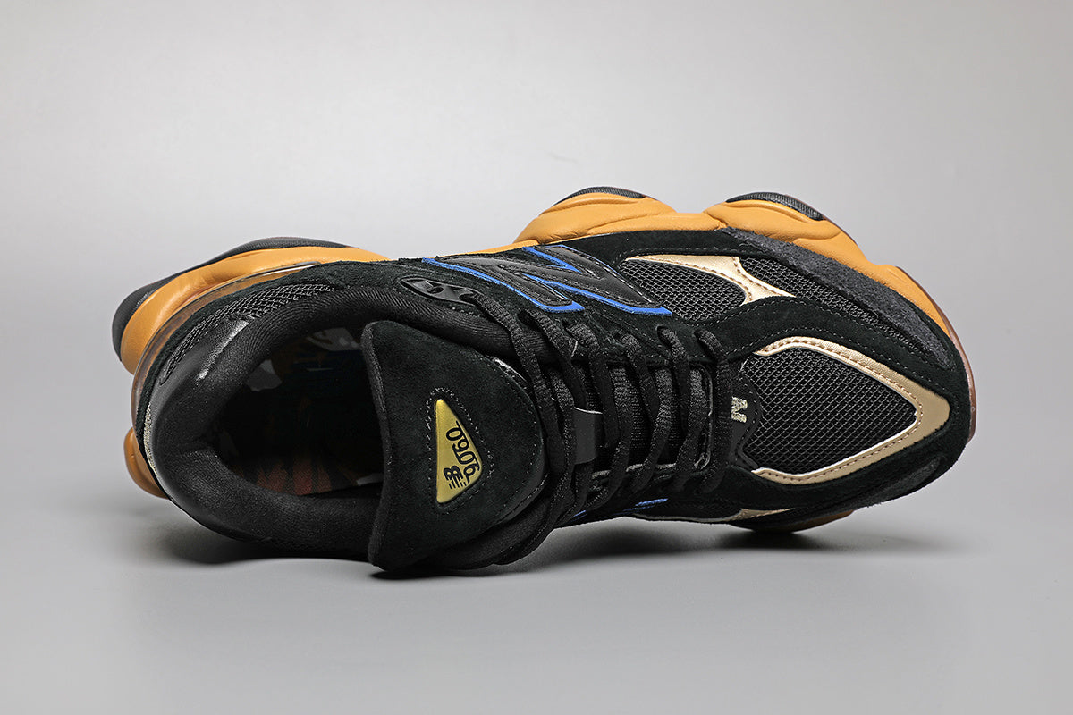 New Balance 9060 -unisex-lenkkarit, musta-keltaiset