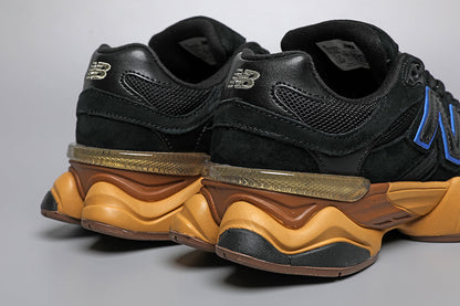 New Balance 9060 -unisex-lenkkarit, musta-keltaiset